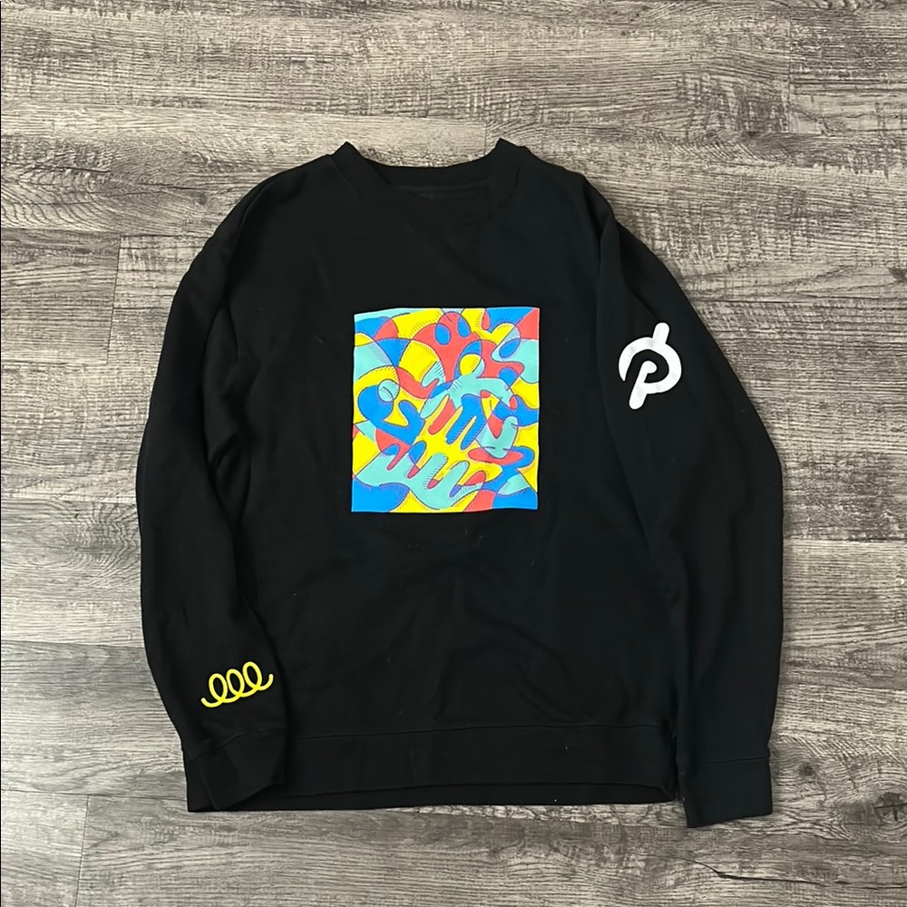 Peloton Black Crewneck Sweater with Vibrant Graphic Design